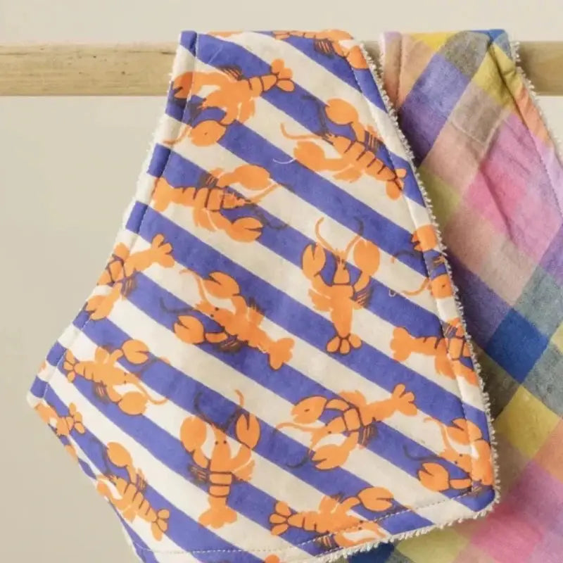 Bavoir Bami Sebastien Orange Apaches Collections